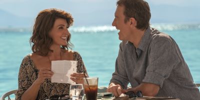 Nia Vardalos and John Corbett enjoy a laugh in a scene from "My Big Fat Greek Wedding 3."