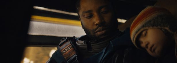 John David Washington as Joshua and Madeleine Yuna Voyles as Alphie in a scene from "The Creator." (20th Century Studios)