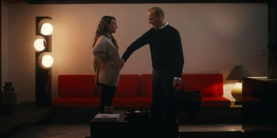 Mila Kunis and Michael Keaton in a scene from "Goodrich."