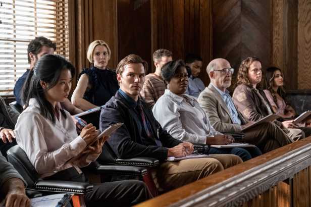 Nicholas Hoult as Justin Kemp, Leslie Bibb as Denice, Adrienne C. Moore as Yolanda and J.K. Simmons as Harold in "Juror #2,” (Claire Folger/Warner Bros. Pictures)