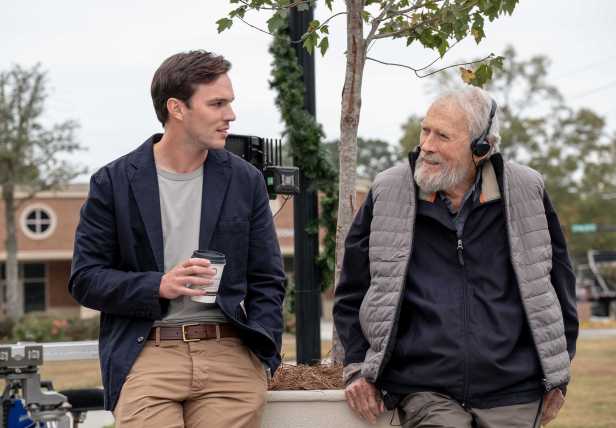 Nicholas Hoult and director Clint Eastwood on the set of "Juror #2." (Claire Folger/Warner Bros. Pictures)
