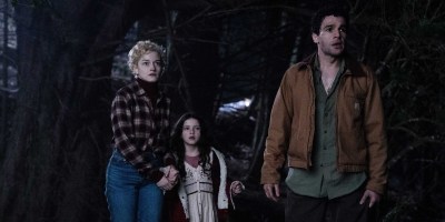 Charlotte (Julia Garner), Ginger (Matilda Firth) and Blake (Christopher Abbott) in "Wolf Man," directed by Leigh Whannell. (Nicola Dove/Universal Pictures)
