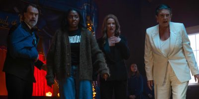 Murray Bartlett, Ayo Edebiri, Juliette Lewis, and Melissa Chambers in a scene from "Opus." (Anna Kooris/A24)