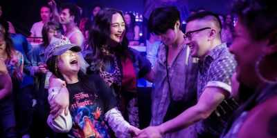 Kelly Marie Tran, Lily Gladstone, Han Gi-Chan and Bowen Yang in “The Wedding Banquet.” (Luka Cyprian/Bleecker Street)