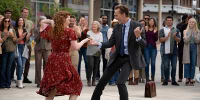 Annalise Basso and Tom Hiddleston in “The Life of Chuck.” (Dan Anderson/Neon)