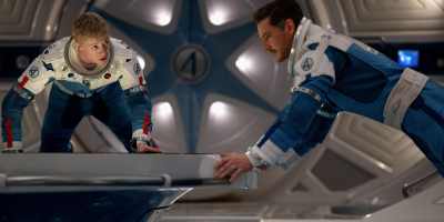 Joseph Quinn as Johnny Storm/Human Torch and Pedro Pascal as Reed Richards/Mister Fantastic in "The Fantastic Four: First Steps." (20th Century Studios/Marvel Studios.)