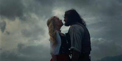 Margot Robbie and Jacob Elordi in a scene from “Wuthering Heights.” (Warner Bros. Pictures)