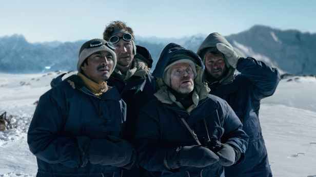 Genden Phuntsok, Tom Hiddleston, Willem Dafoe and Benjamin Hoetjes in "Tenzing," now streaming on Apple TV.
